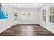 Bright dining room features hardwood floors and built-in corner cabinet at 2330 Westminster Ct, Winter Park, FL 32789