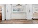 White kitchen cabinets and expansive countertops create ample storage and workspace at 2330 Westminster Ct, Winter Park, FL 32789