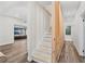 Modern staircase with wooden accent wall at 2330 Westminster Ct, Winter Park, FL 32789