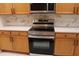 Stainless steel Samsung range and microwave in kitchen at 2525 San Tecla St # 101, Orlando, FL 32835