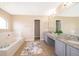 Primary bathroom with double vanity at 3279 Fairfield Dr, Kissimmee, FL 34743