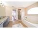 Primary bathroom with granite vanity at 3279 Fairfield Dr, Kissimmee, FL 34743