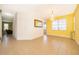 Bright dining area with yellow walls and tile flooring at 3279 Fairfield Dr, Kissimmee, FL 34743