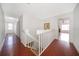 Upstairs hall with hardwood floors at 3279 Fairfield Dr, Kissimmee, FL 34743
