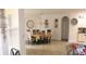 Elegant dining room with formal table and chairs, and ample natural light at 428 Palastro Ave, Auburndale, FL 33823
