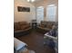 Living room with two sofas and wood-look flooring at 428 Palastro Ave, Auburndale, FL 33823