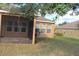 Spacious screened patio adjacent to the house at 428 Palastro Ave, Auburndale, FL 33823