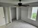 Bedroom with ceiling fan and carpeted floor at 433 Eastbridge Dr, Oviedo, FL 32765