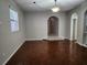 Dining room with dark tile floors and arched entryway at 433 Eastbridge Dr, Oviedo, FL 32765