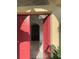 Inviting entryway with red doors and view to staircase at 433 Eastbridge Dr, Oviedo, FL 32765
