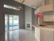 Kitchen with breakfast bar, pool view, and fireplace at 433 Eastbridge Dr, Oviedo, FL 32765