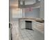 Bright kitchen with white cabinets and stainless steel appliances at 433 Eastbridge Dr, Oviedo, FL 32765