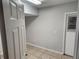 Laundry room with tile floor and exterior access at 433 Eastbridge Dr, Oviedo, FL 32765