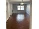 Large living room with tile floors and ample natural light at 433 Eastbridge Dr, Oviedo, FL 32765