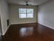 Living room with dark tile floors and fireplace at 433 Eastbridge Dr, Oviedo, FL 32765