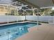 Screened-in pool with a spacious deck at 433 Eastbridge Dr, Oviedo, FL 32765
