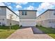 Townhouse exterior with brick driveway at 4970 Citrus Leaf Blvd, Winter Garden, FL 34787