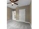Spacious bedroom with neutral walls and carpet flooring at 510 Palm Ave, Eustis, FL 32726