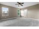 Large bedroom featuring ceiling fan and ample natural light at 510 Palm Ave, Eustis, FL 32726
