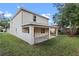 Two-story house with covered patio and side yard at 510 Palm Ave, Eustis, FL 32726