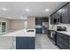 Modern kitchen with stainless steel appliances and an island at 510 Palm Ave, Eustis, FL 32726