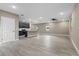 Spacious living room with tile floors and ceiling fan at 510 Palm Ave, Eustis, FL 32726