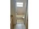 Clean bathroom with a bathtub and tiled floor at 1005 Chase Dr, Winter Garden, FL 34787