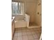 Bathroom with a bathtub, shower, and tiled flooring at 1005 Chase Dr, Winter Garden, FL 34787
