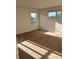 Spacious carpeted bedroom with large windows and ample natural light at 1005 Chase Dr, Winter Garden, FL 34787