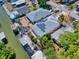 Aerial view of home with solar panels and boat dock at 110 Coleman St, Edgewater, FL 32141
