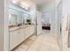 Main bathroom with dual sinks and granite countertop at 110 Coleman St, Edgewater, FL 32141