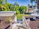 Steps leading down to a canal-side dock at 110 Coleman St, Edgewater, FL 32141