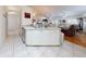Kitchen with white cabinets, granite countertops, and stainless steel appliances at 110 Coleman St, Edgewater, FL 32141
