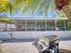 Spacious screened porch with outdoor grill at 110 Coleman St, Edgewater, FL 32141