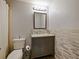 Modern bathroom with updated vanity and tile shower at 1542 Travertine Ter, Sanford, FL 32771