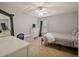 Cozy bedroom with a double bed and built-in dresser at 1542 Travertine Ter, Sanford, FL 32771