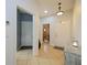 Bright and spacious entrance hall with tile flooring and views to other rooms at 1542 Travertine Ter, Sanford, FL 32771