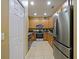 Well-equipped kitchen with stainless steel appliances and ample cabinetry at 1542 Travertine Ter, Sanford, FL 32771