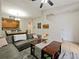 Open living room connecting to dining and kitchen areas at 1542 Travertine Ter, Sanford, FL 32771