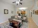 Spacious living room with a comfortable sectional sofa and open floor plan at 1542 Travertine Ter, Sanford, FL 32771