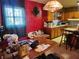 Kitchen features wood cabinets and a breakfast table at 1701 N Hastings St, Orlando, FL 32808