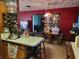 Kitchen with wood cabinets and views into living room at 1701 N Hastings St, Orlando, FL 32808