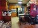 Kitchen with wood cabinets, island, and appliances at 1701 N Hastings St, Orlando, FL 32808