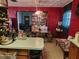 Kitchen with wood cabinets and views into dining area at 1701 N Hastings St, Orlando, FL 32808