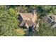 Bird's eye view of house showing roofline and landscaping at 25628 Hawks Run Ln, Sorrento, FL 32776