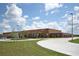 Brick elementary school with a large parking lot and landscaping at 25628 Hawks Run Ln, Sorrento, FL 32776
