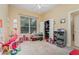 Playroom with ample space for toys and activities at 25628 Hawks Run Ln, Sorrento, FL 32776