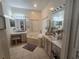 Bathroom features a corner soaking tub, double vanity, and ample counter space at 501 Heritage Trail St, Kissimmee, FL 34759