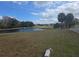 Scenic golf course view with pond and lush landscaping at 501 Heritage Trail St, Kissimmee, FL 34759