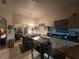 Kitchen with stainless steel appliances and an island with butcher block top at 501 Heritage Trail St, Kissimmee, FL 34759